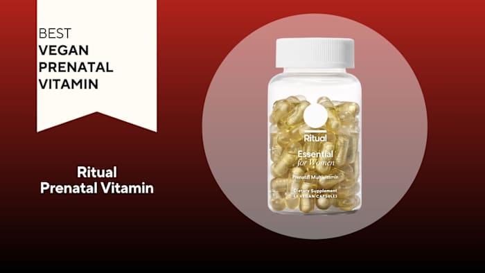 A red background with a white banner that says, "Best Vegan Prenatal Vitamin" next to a clear container filled with gold capsules that says Ritual Essential for Women Prenatal Multivitamin